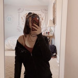 small vs pink black zip up